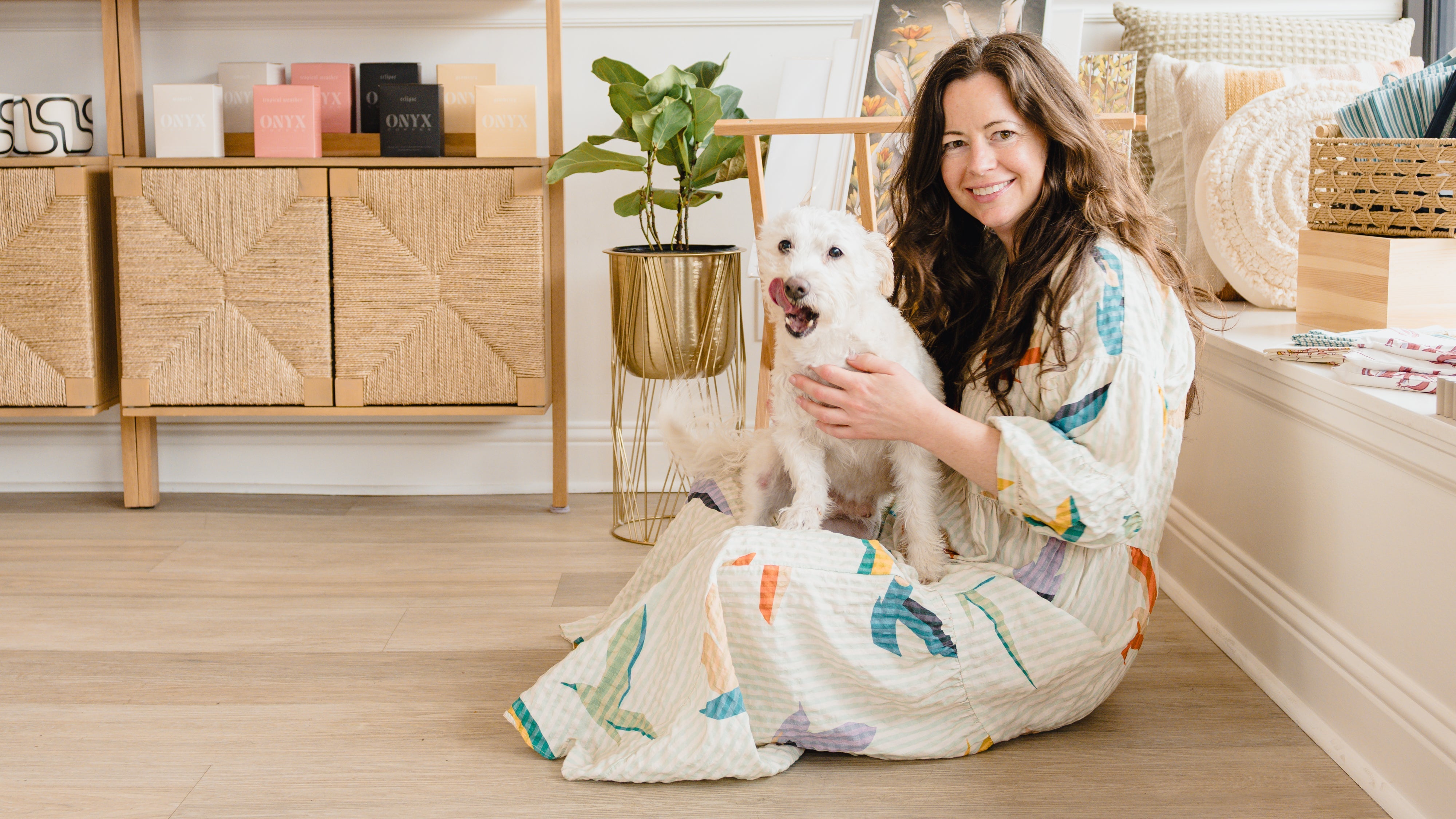 wax crescent owner Kym and Louie sitting in storefront and candle studio in downtown Longmont, Colorado