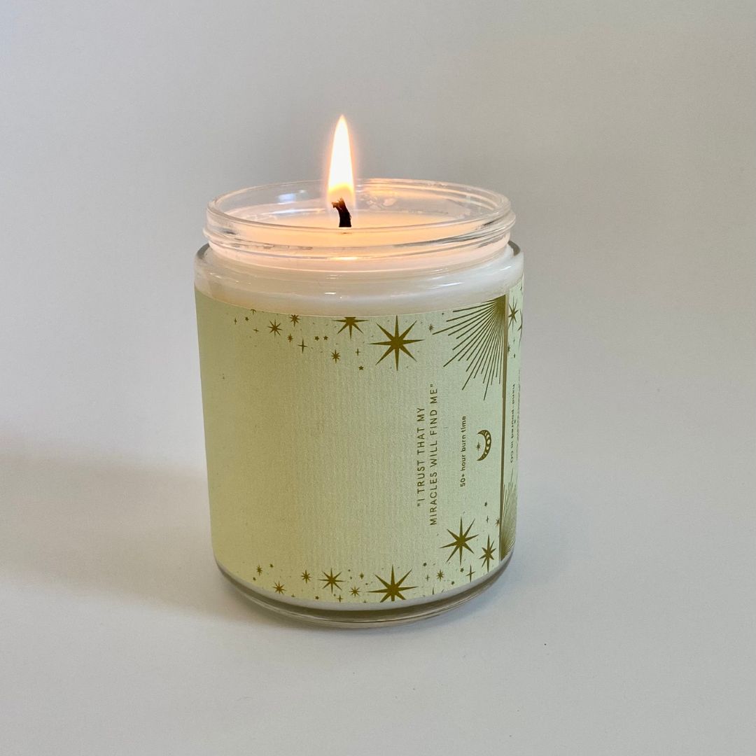 Pumpkin Chai & Vanilla soy candle by Wax Crescent, featuring a celestial-inspired label with golden stars and a burning wick, evoking warm and cozy autumn vibes.
