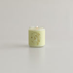 Aries Zodiac soy wax candle in a minimalist glass jar, showcasing the Wax Crescent logo, hand-poured with vibrant, bold scents reflecting the fiery Aries spirit. Perfect for astrology enthusiasts and home decor, made from eco-friendly soy wax.moon
