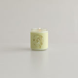 Aries Zodiac soy wax candle in a minimalist glass jar, showcasing the Wax Crescent logo, hand-poured with vibrant, bold scents reflecting the fiery Aries spirit. Perfect for astrology enthusiasts and home decor, made from eco-friendly soy wax.moon