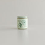 capricorn astrology candle with zodiac symbol of goat and glyph