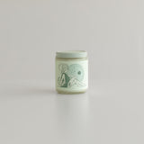 capricorn astrology candle with zodiac symbol of goat and glyph
