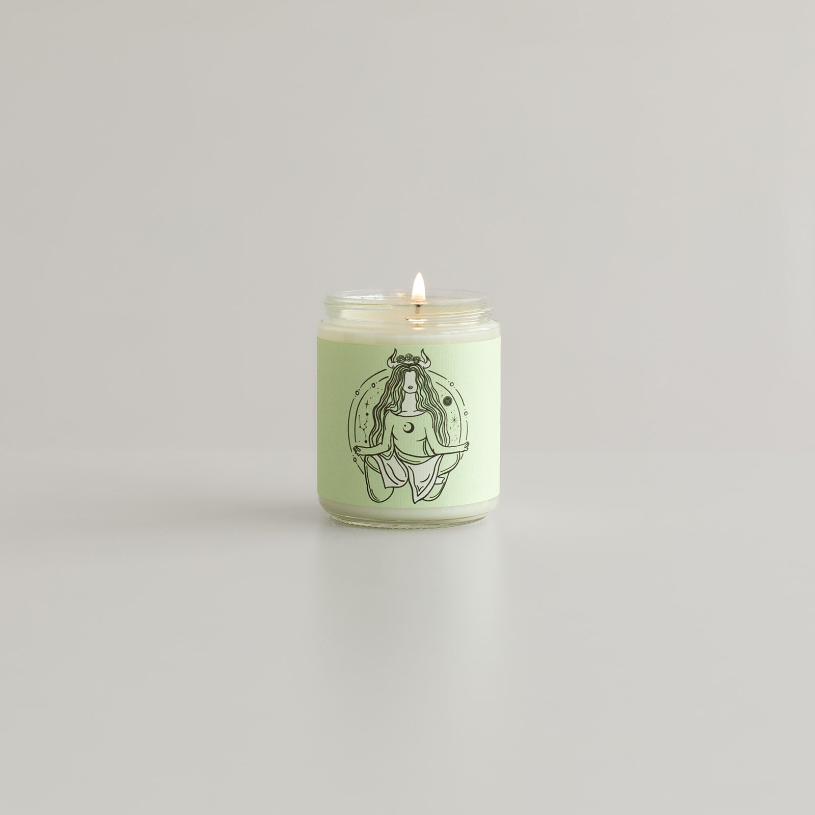 soy wax astrology taurus candle in jar with zodiac symbol of taurus