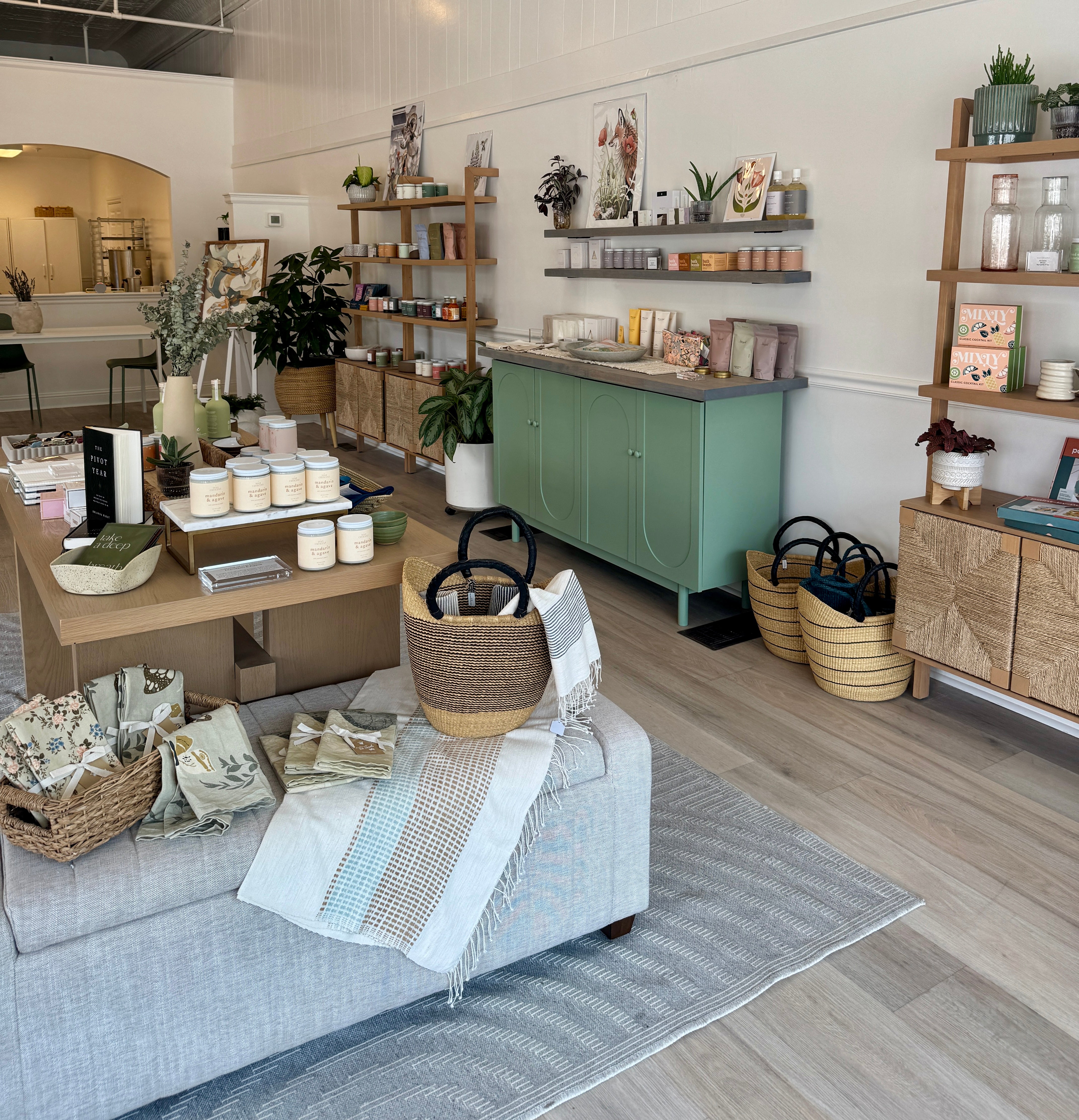 Wax Crescent Storefront in downtown Longmont. Stocked with curated gifts, hand poured soy candles and holiday gifts and a place to make your own candles and take a candle-making class 