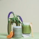 Wax Crescent Matcha & Lemongrass soy candle with green tea, orange, and jasmine notes, styled with greenery and a matcha latte for a refreshing, non-toxic ambiance.