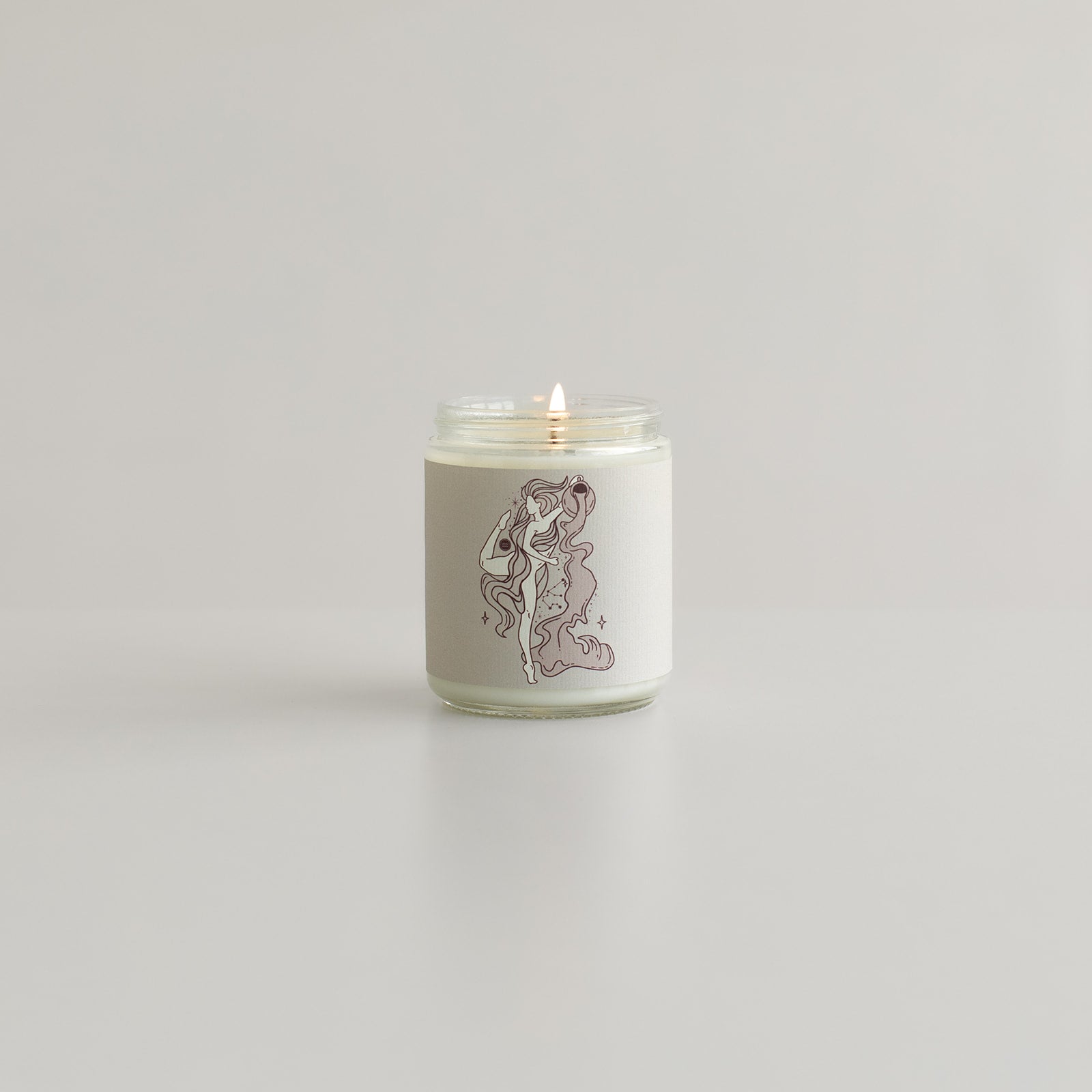 aquarius astrology zodiac candle with woman pouring water soy wax 