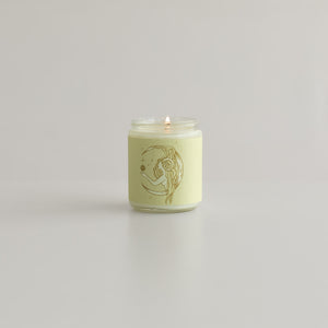 Aries astrology soy wax candle with zodiac ram and crescent moon