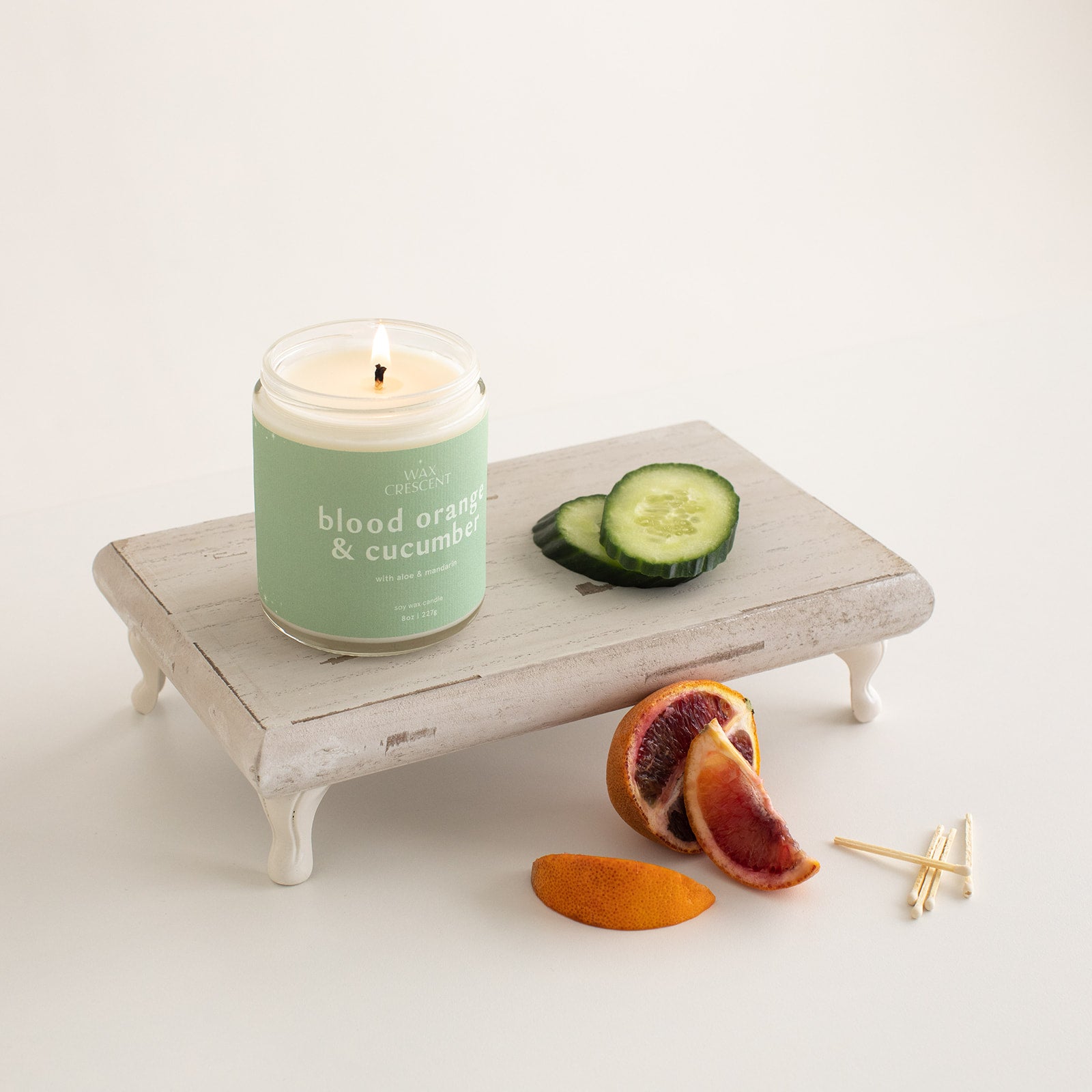 small batch soy wax candle show with blood oranges and cucumbers 