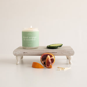 soy wax candle scented in blood orange and cucumber with nontoxic ingredients 