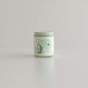 capricorn astrology candle with zodiac symbol of goat and glyph