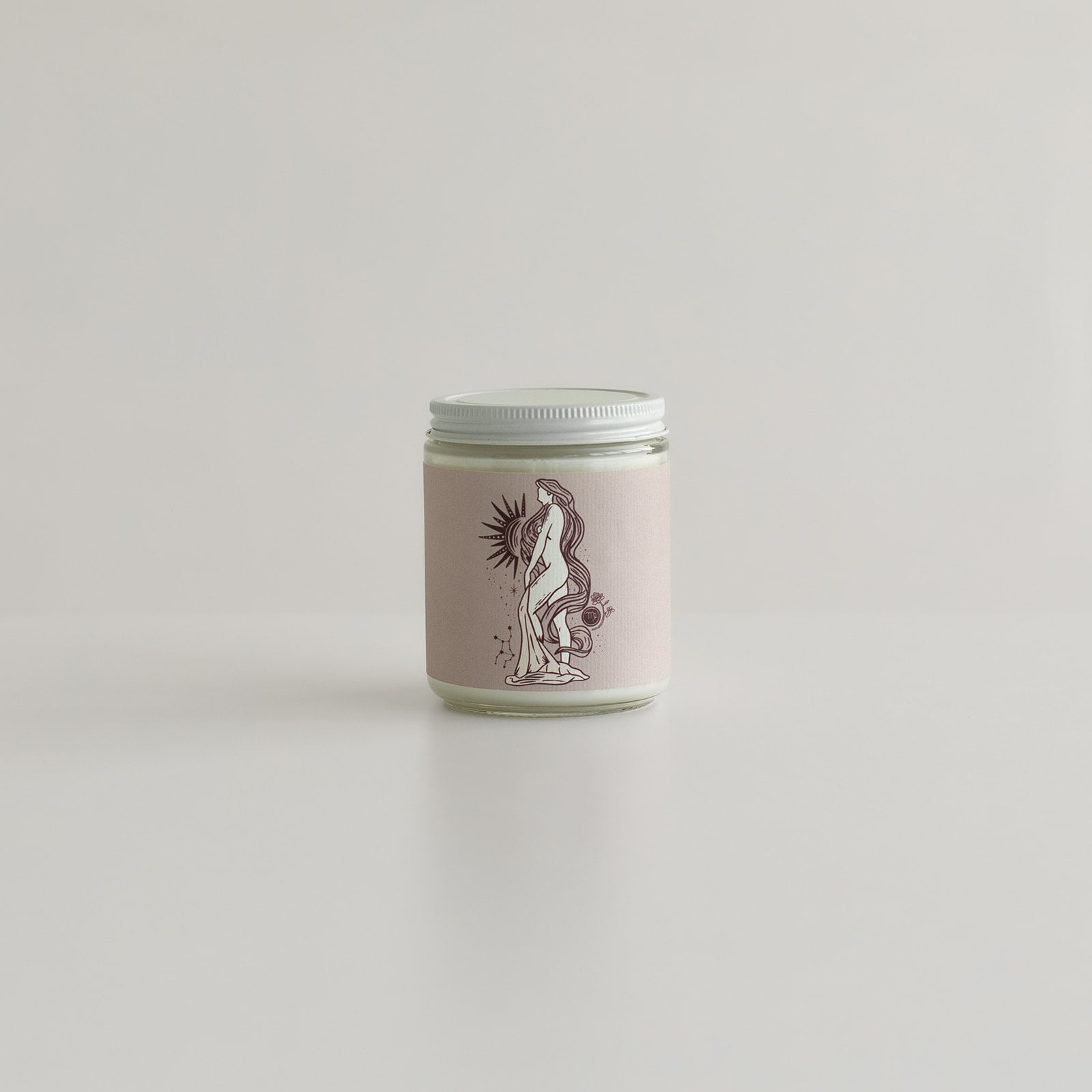 hand poured nontoxic soy wax candle in a jar with virgo astrology zodiac symbol